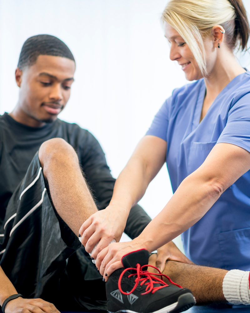 nurse and athlete with injury